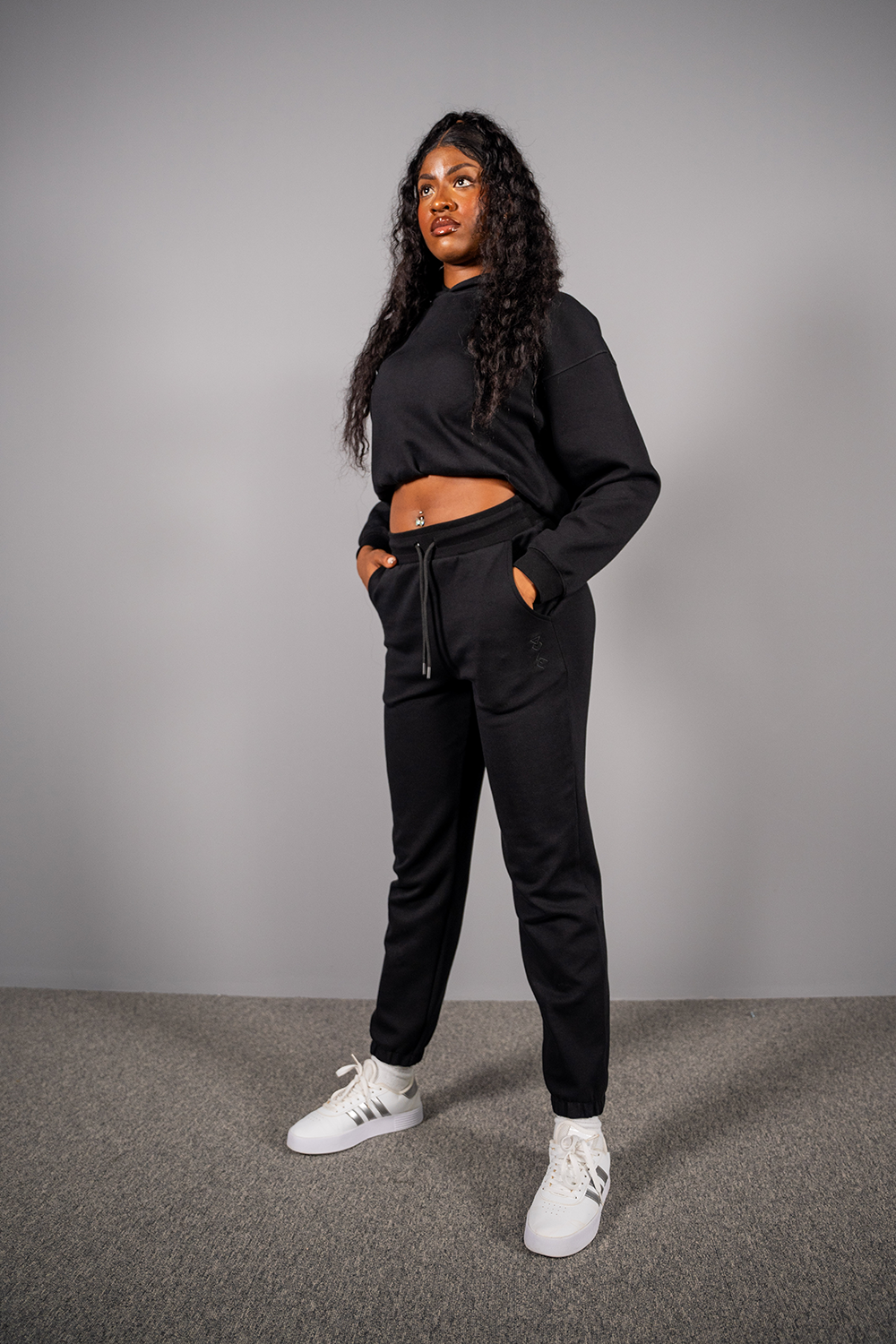 THE women s black crop hoodie