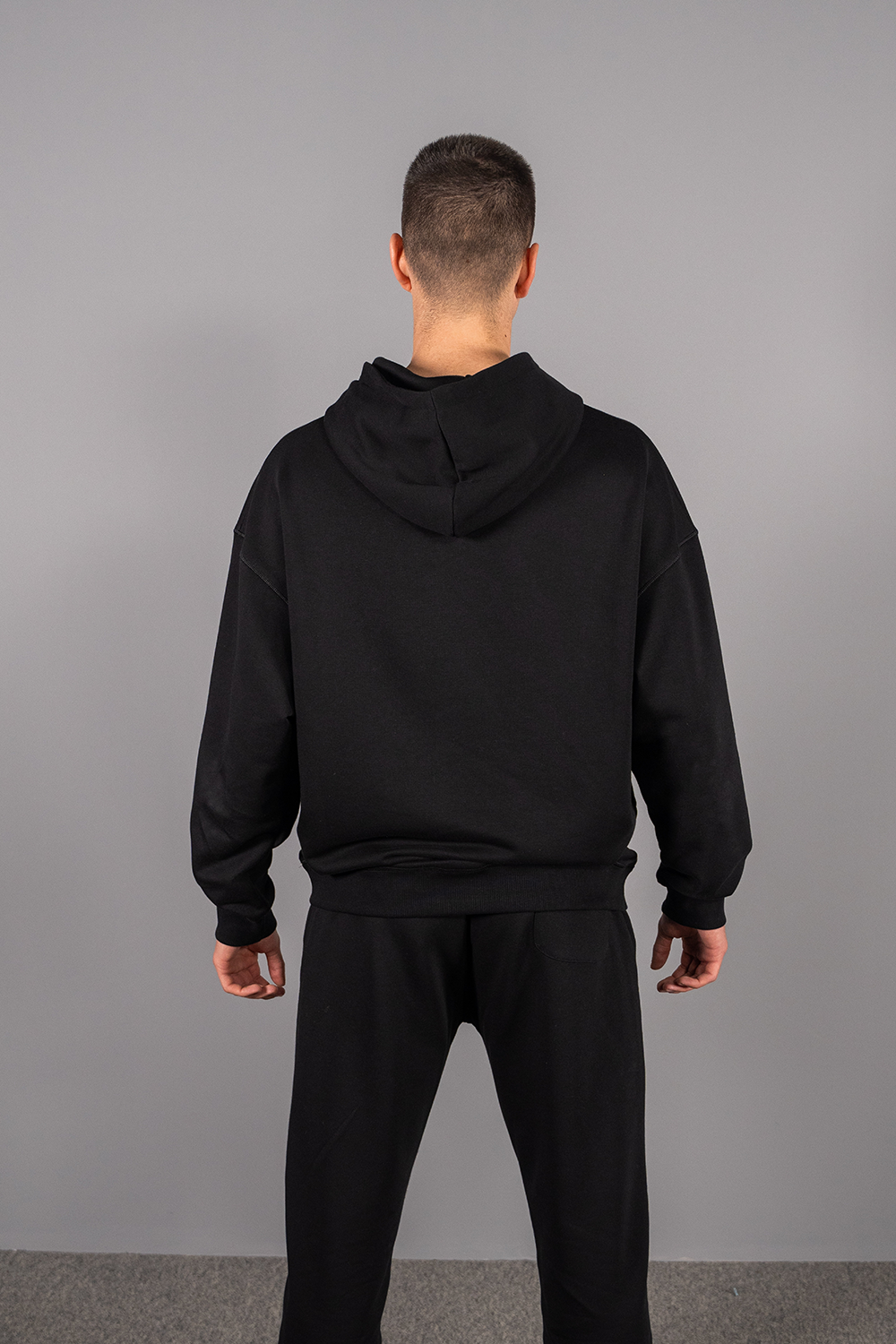 THE unisex loose black hoodie - do we